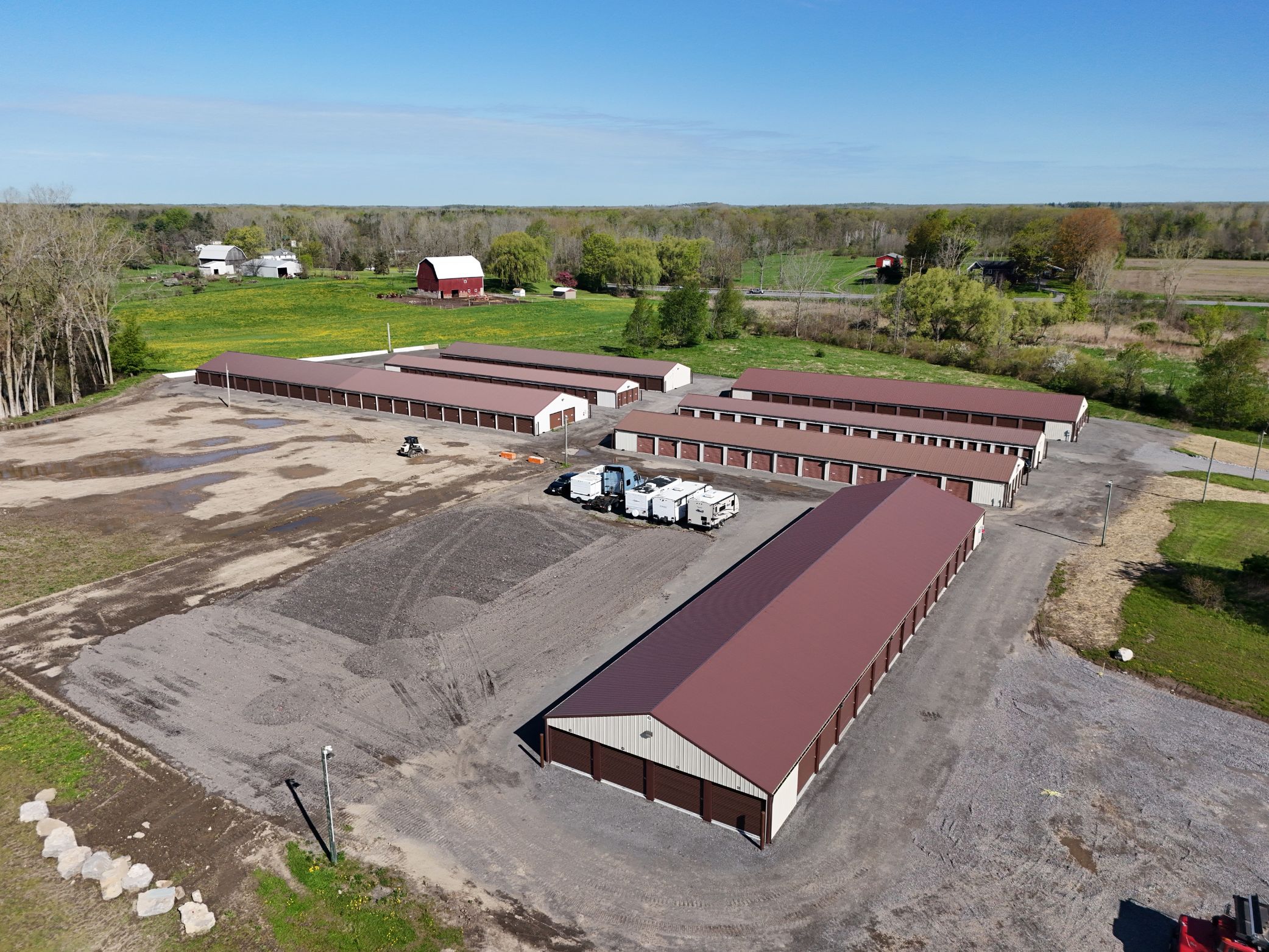 Aerial view of A-Verdi Self Storage facility with multiple storage buildings and gravel driveways
